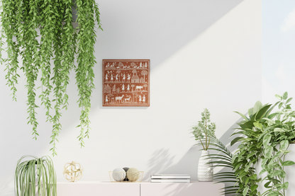 Decorative wall art on a gray wall with a white cabinet and plants below.